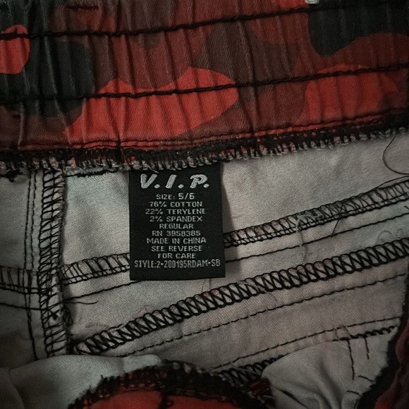 Red and Black Camo, Cargo Style Pants. Deep front pockets. Size 5-6 can fit a 7. - Picture 10 of 10